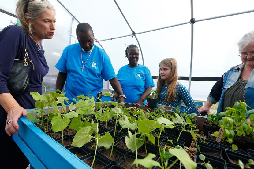 Suzanne Massey, (from left) Charles Bryant, Anzinette Carter, Harper Massey, 11, and Susan...