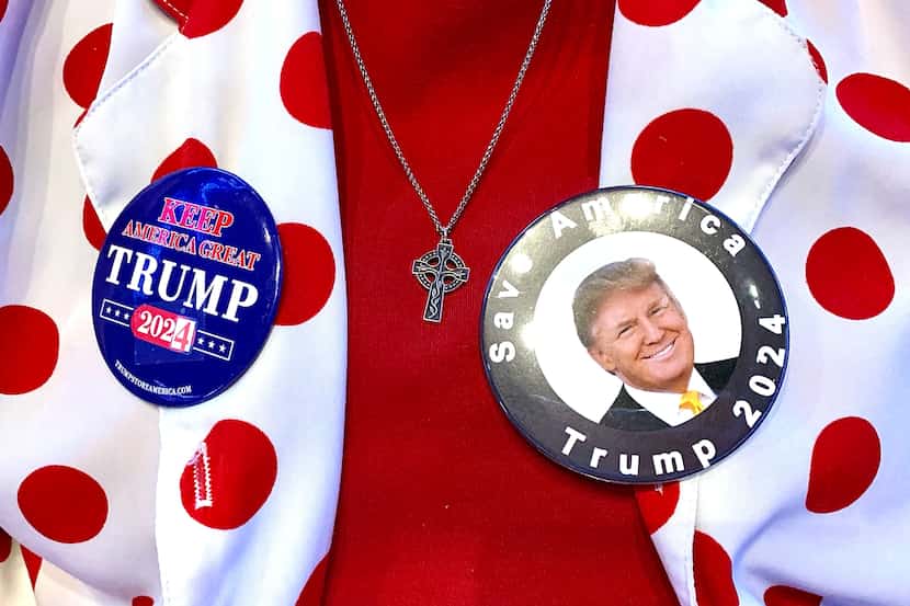In this file photo, Colleen Canion wears buttons supporting Donald Trump at The History Tour...