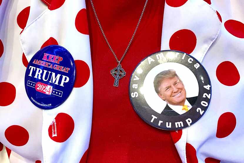 In this file photo, Colleen Canion wears buttons supporting Donald Trump at The History Tour...