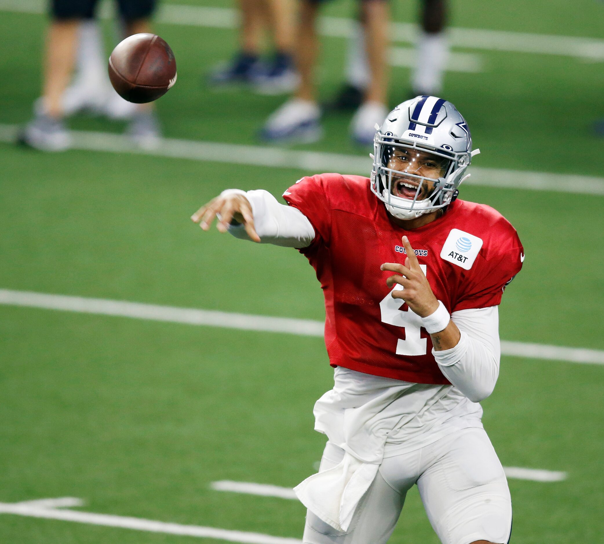 Dallas Cowboys quarterback Dak Prescott (4) attempts a pass in practice during training camp...