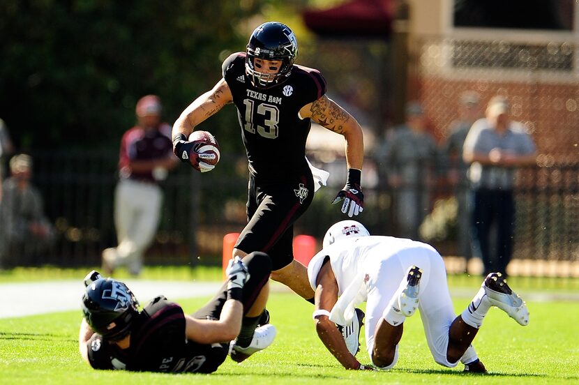 STARKVILLE, MS - NOVEMBER 03:  Mike Evans #13 of the Texas A&M Aggies runs for yards agaisnt...