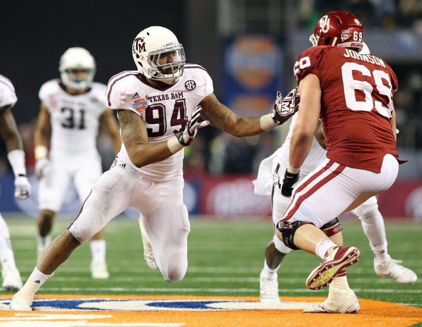 Jan 4, 2013; Arlington, TX, USA; Texas A&M Aggies defensive end Damontre Moore (94) rushes...