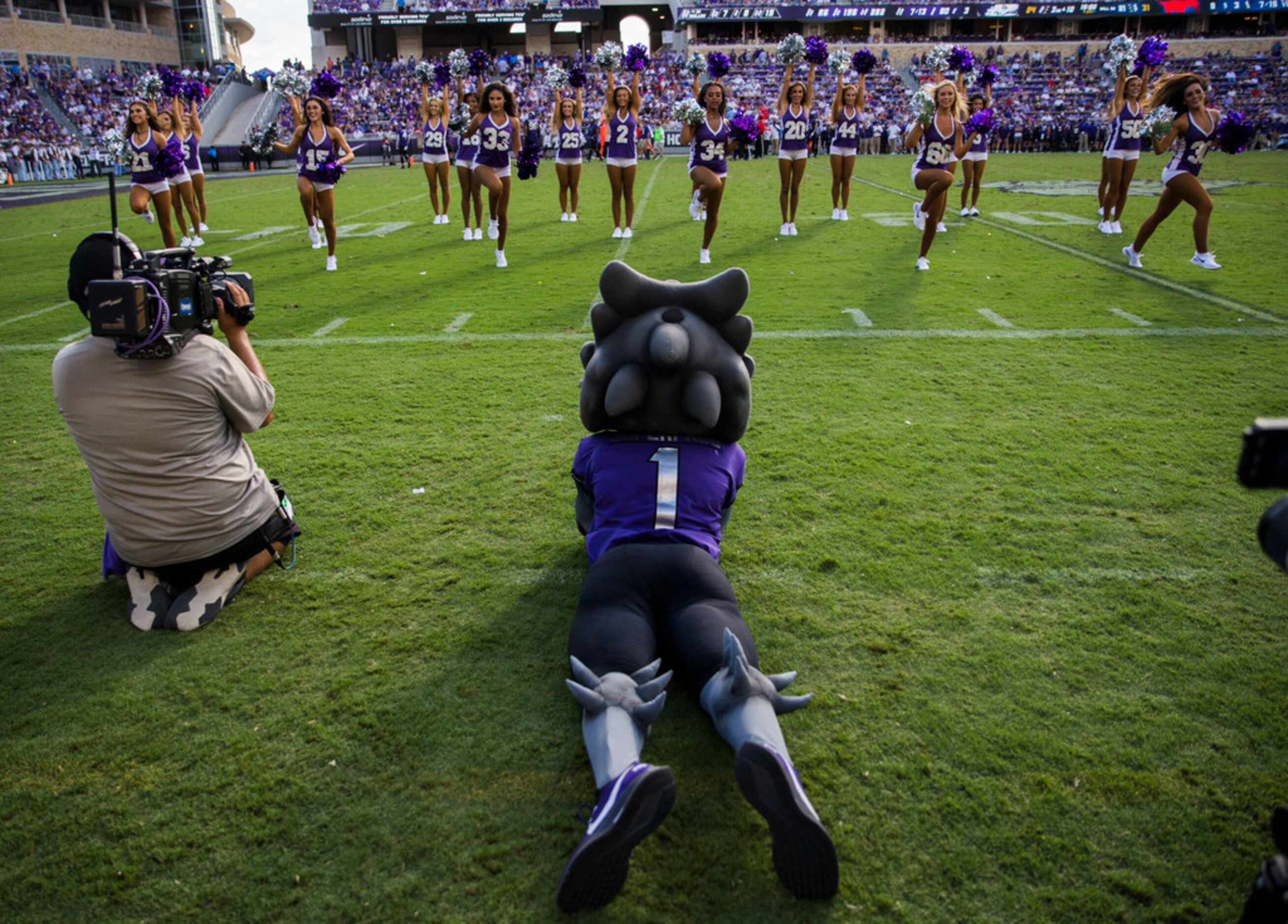 The TCU Horned Frog mascot watches the dance team perform between the third and fourth...