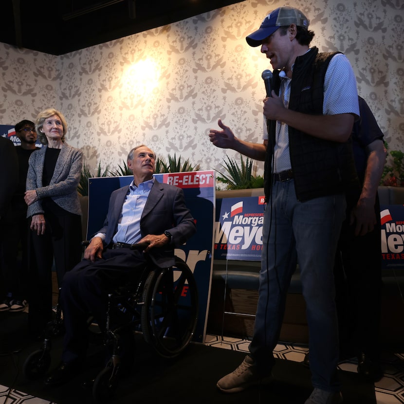 Texas Rep. Morgan Meyer, R-University Park, right, thanks Gov. Greg Abbott for his...