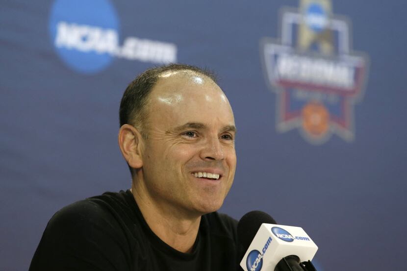 Oregon State head coach Scott Rueck smiles during a news conference ahead of a regional...