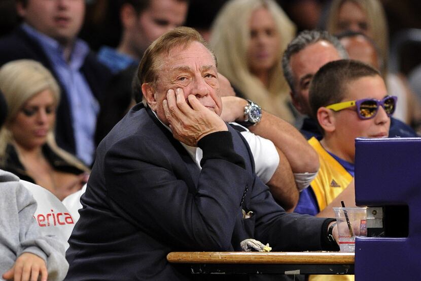 In this Feb. 25, 2011, file photo, Los Angeles Clippers owner Donald Sterling looks on...