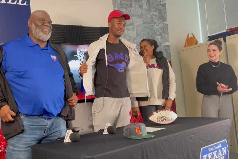 Southlake Carroll tight end RJ Maryland shows off his SMU shirt after announcing his college...