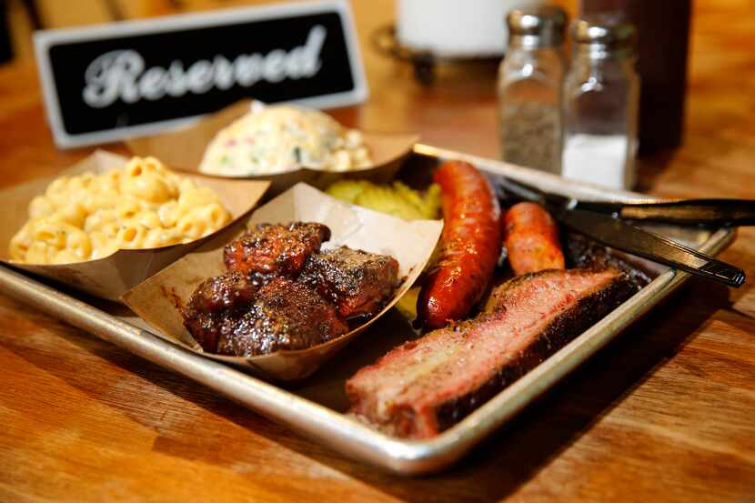 Heim Barbecue sells green chile mac & cheese, twice-baked potato salad, bacon burnt ends,...