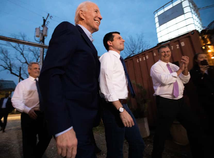 Former Democratic presidential primary candidate Pete Buttigieg (center), at an event where...