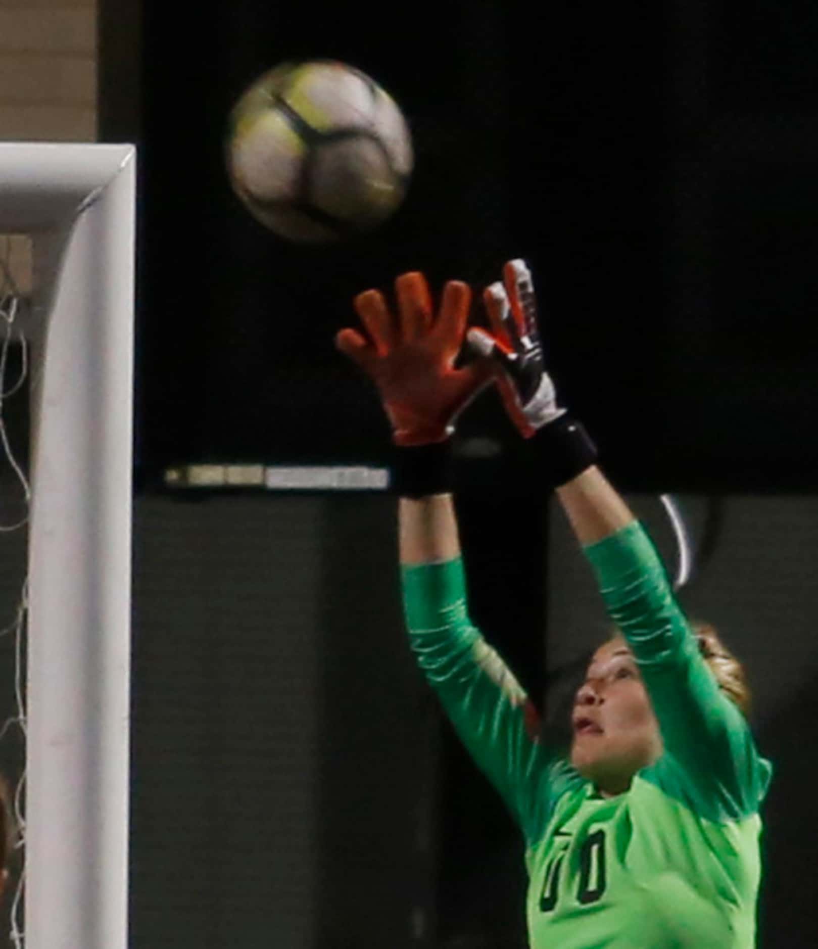 Coppell goalkeeper Lauren Kellett (00) leaps to make a save during first half action against...