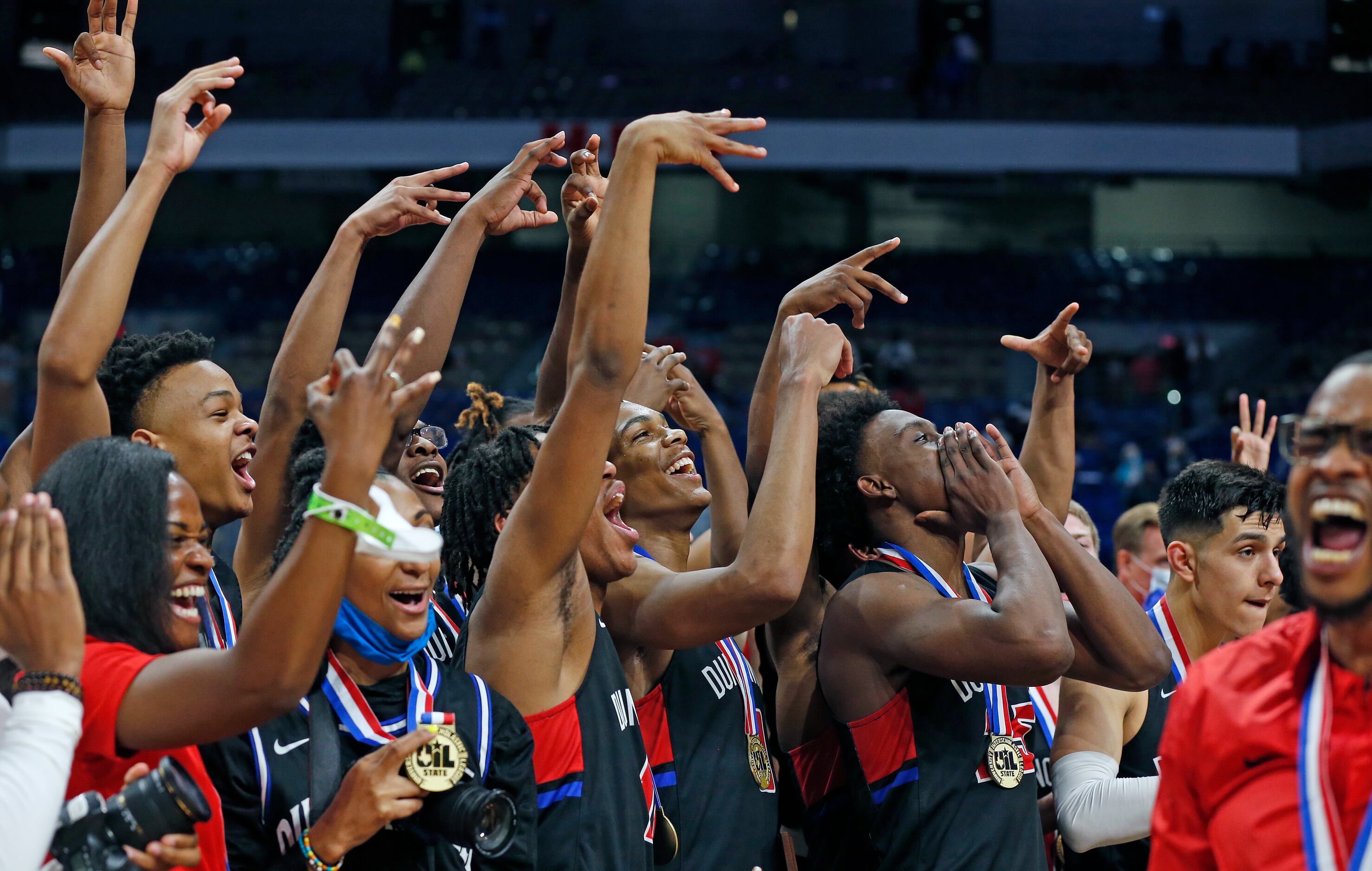 Duncanville celebrates after the game. UIL boys Class 6A basketball state championship game...