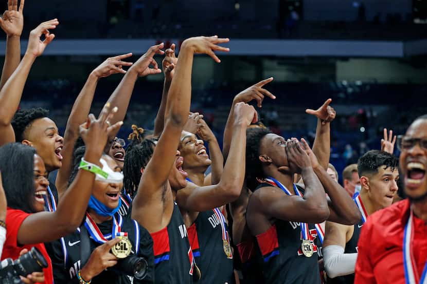 Duncanville celebrates after the game. UIL boys Class 6A basketball state championship game...