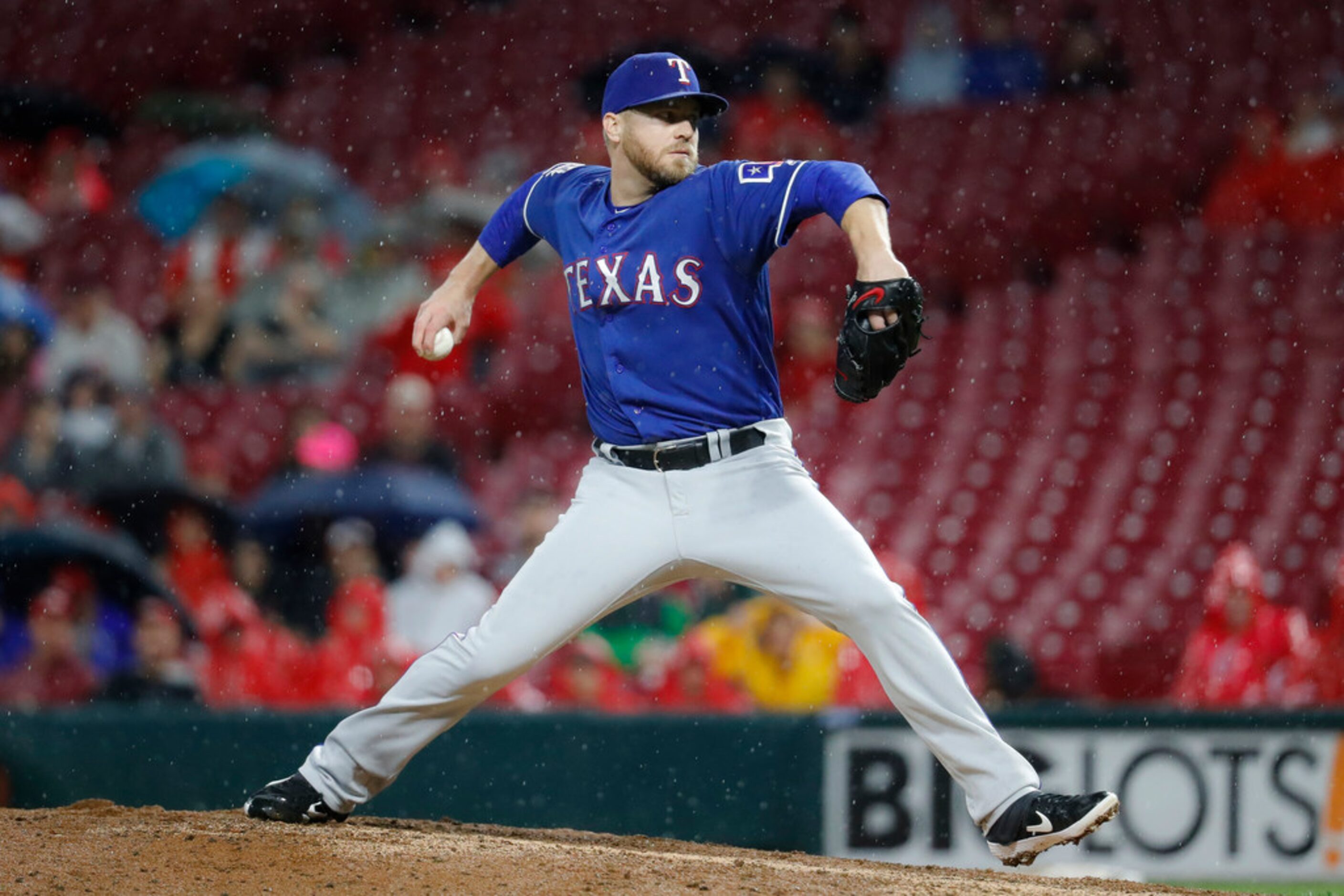 Texas Rangers relief pitcher Shawn Kelley throws during the ninth inning of the team's...