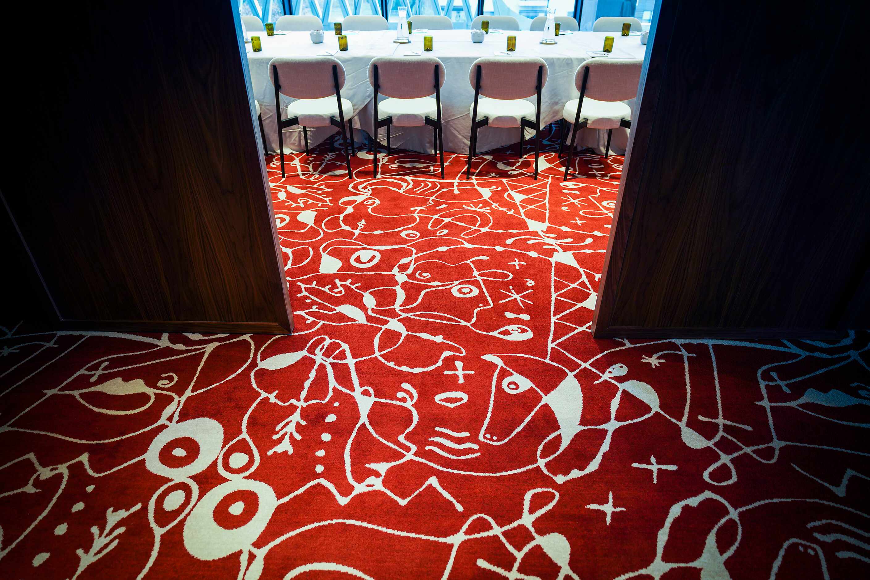 Texas themed carpet runs into a meeting room at the new the Virgin Hotels Dallas on Monday,...
