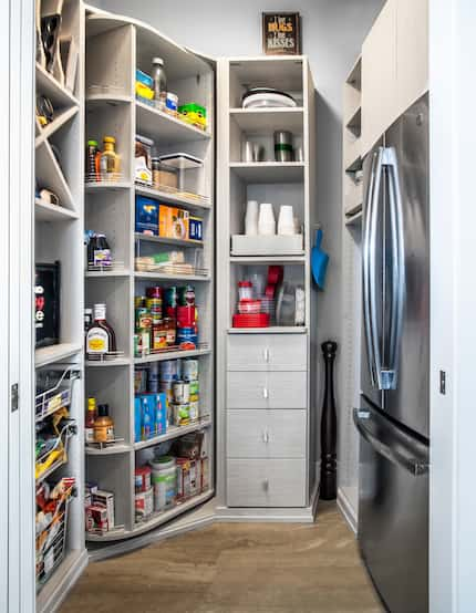 The 360 organizer is shown here as the corner section of a kitchen pantry. The unit swivels...