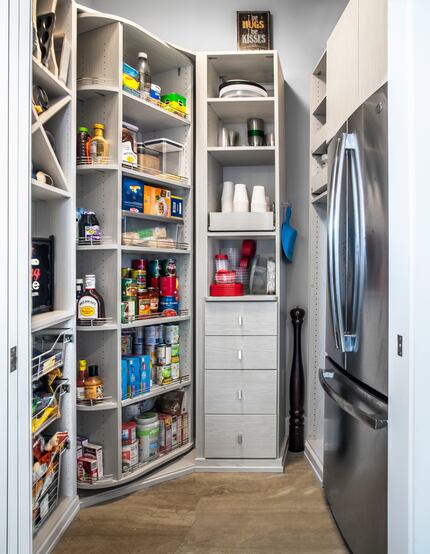 The 360 organizer is shown here as the corner section of a kitchen pantry. The unit swivels...