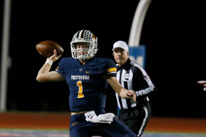 Prestonwood Christian Academy Quarterback Wiley Green (1) makes a pass to receivers  during...