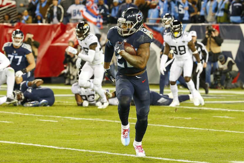NASHVILLE, TN - DECEMBER 6: Derrick Henry #22 of the Tennessee Titans runs downfield with...