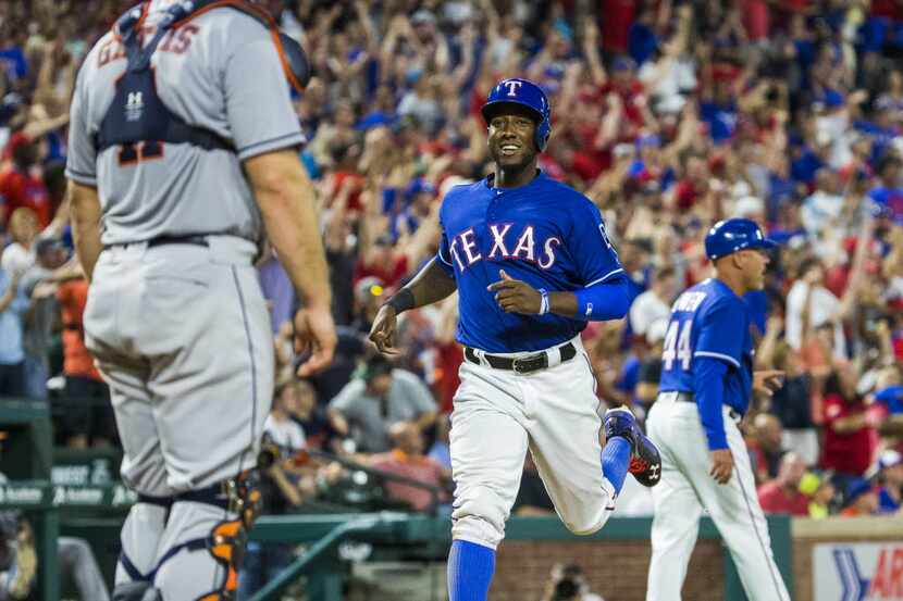 Texas Rangers first baseman Jurickson Profar (19) runs to home plate after center fielder...