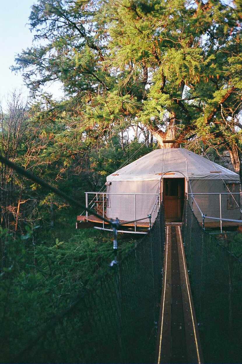 
The Lofthaven II treehouse in Spicewood is perched high above a ravine in the canopy of an...