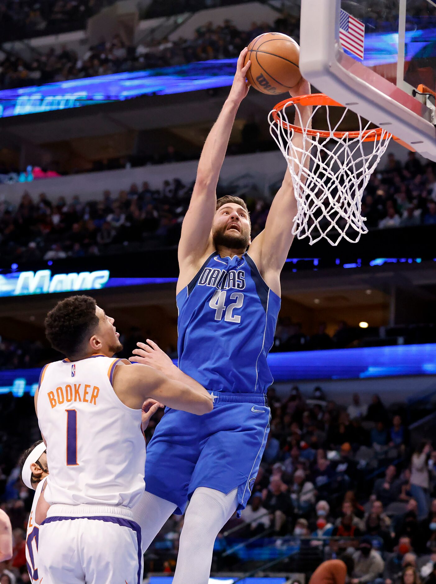 Dallas Mavericks forward Maxi Kleber (42) receives a pass from guard Luka Doncic for a...