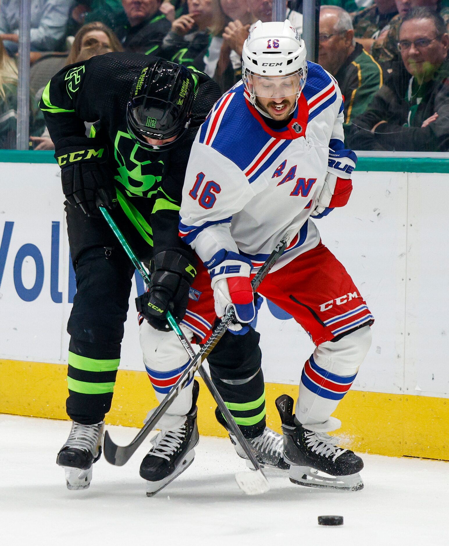 Dallas Stars center Radek Faksa (12) and New York Rangers center Vincent Trocheck (16)...