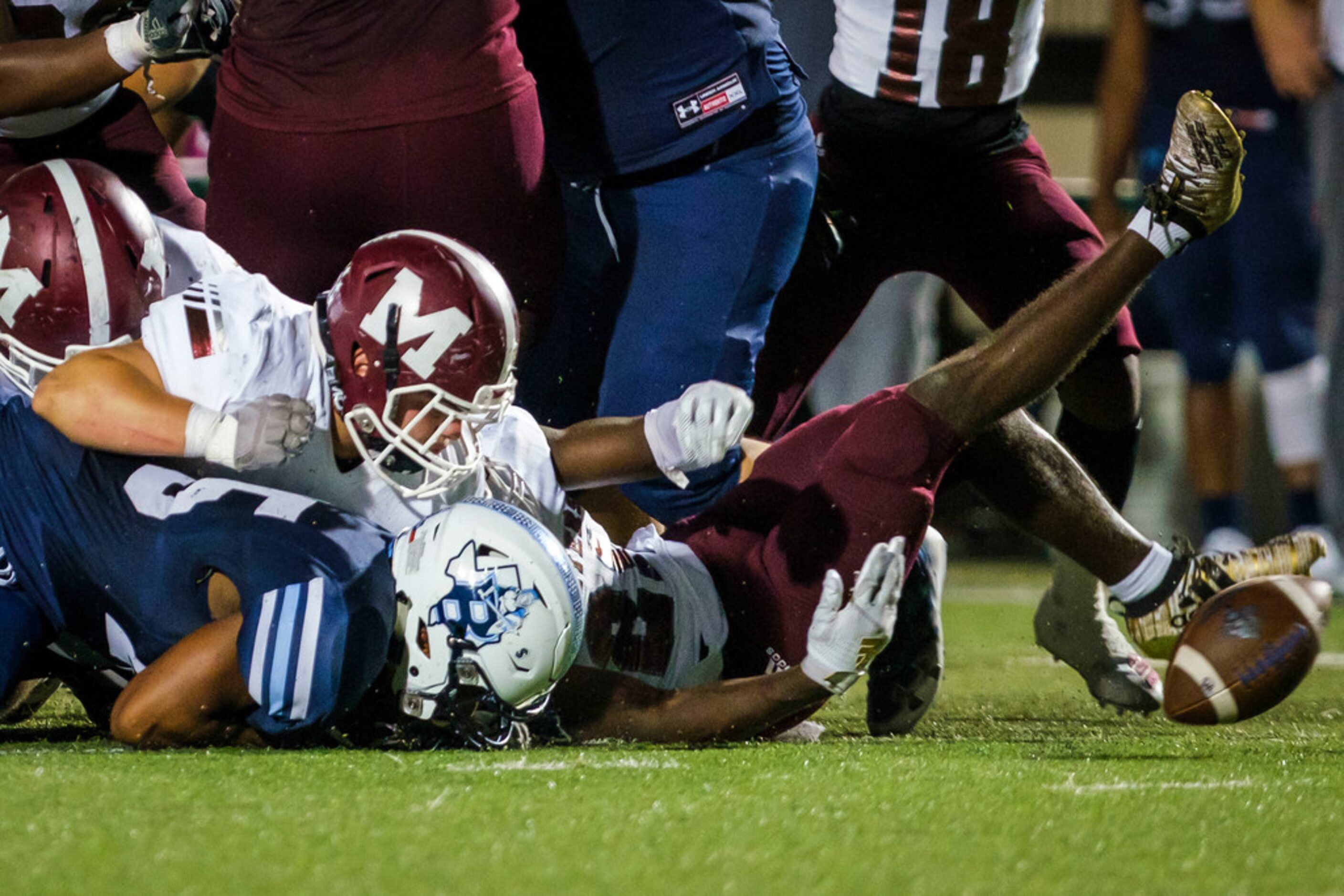 A fumble bounces away from L.D. Bell running back  Cameron Johnson (25) during the first...