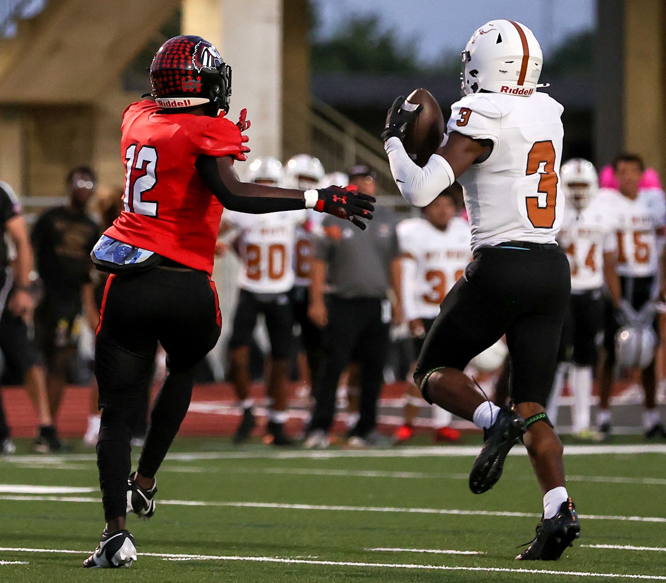 W.T. White defensive back Ardon West (3) comes up with an interception in front of Creekview...