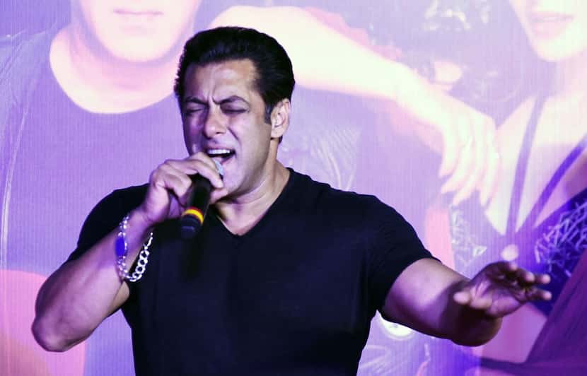 Indian Bollywood actor Salman Khan sings during the music launch of the upcoming action...