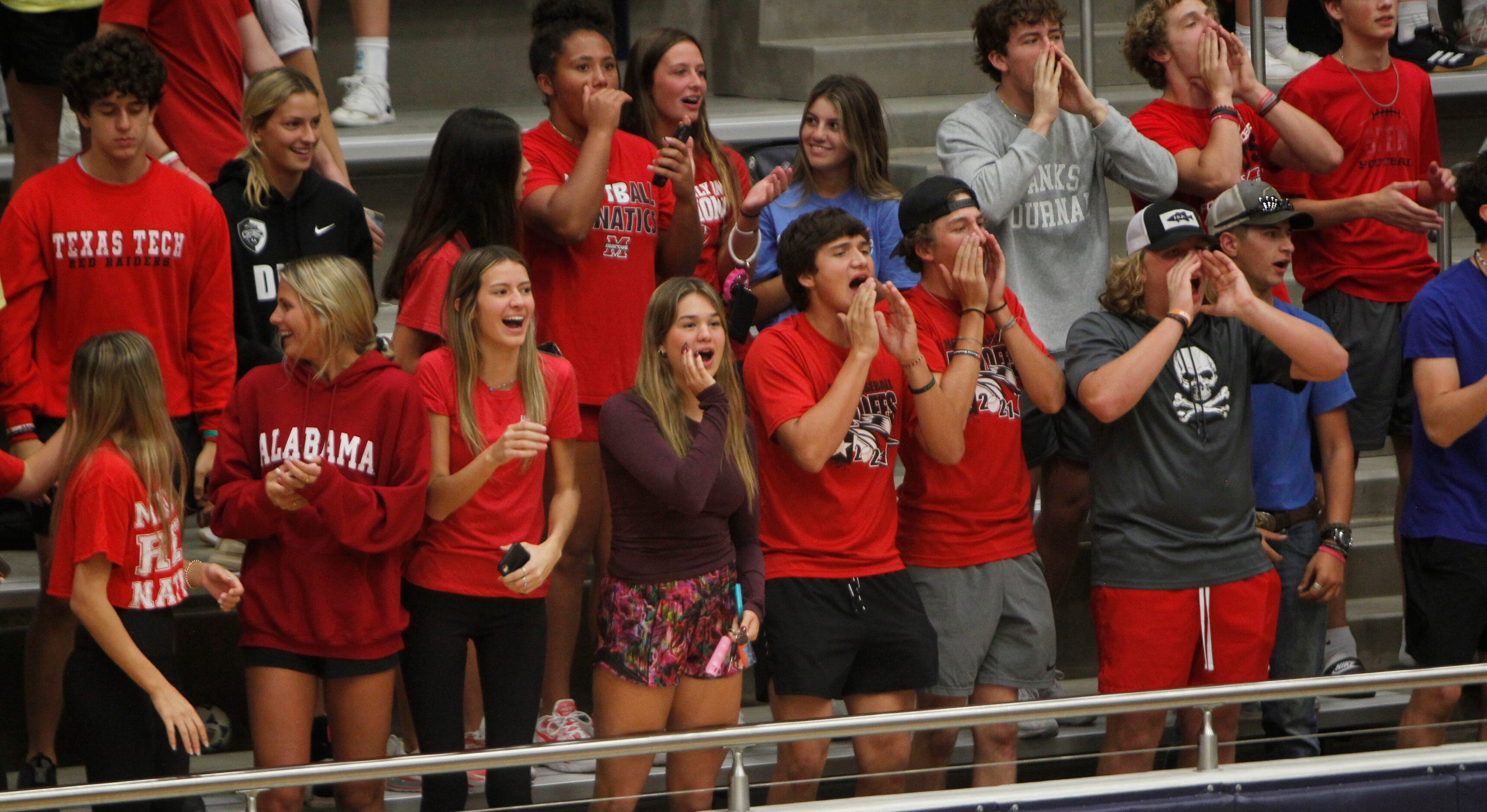 Flower Mound Marcus fans show their support during the 5th and deciding set of their match...