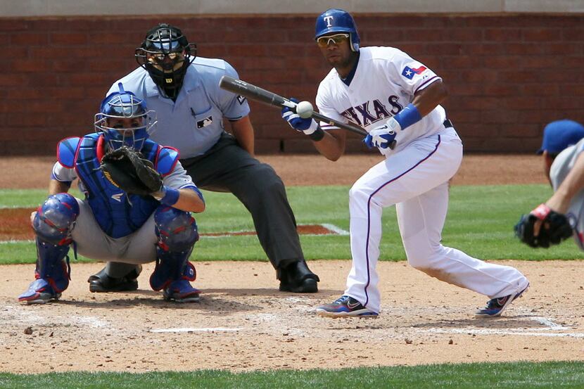 Texas shortstop Elvis Andrus bunts during the Toronto Blue Jays and the Texas Rangers major...