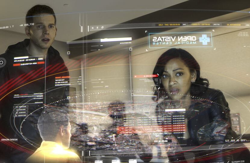 Stark Sands (left) and co-star Meagan Good in a scene from "Minority Report"