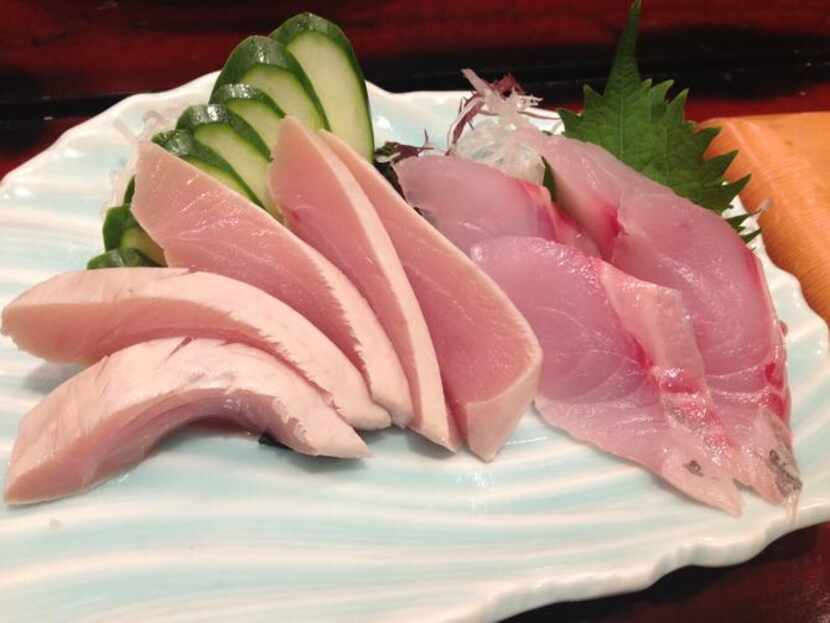 
Albacore (left) and suzuki (sea bass) sashimi at Sushi Sake 
