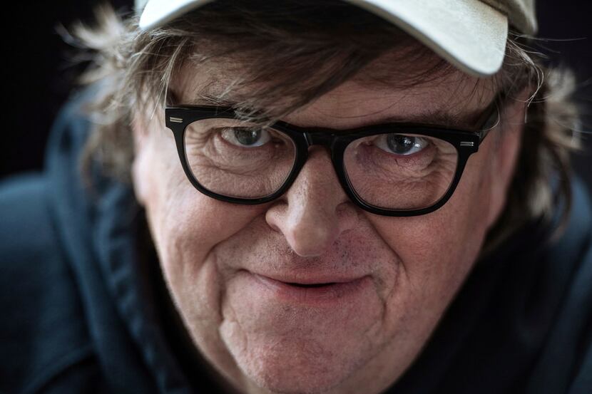 Film director Michael Moore poses for a portrait while promoting his new movie, "Fahrenheit...