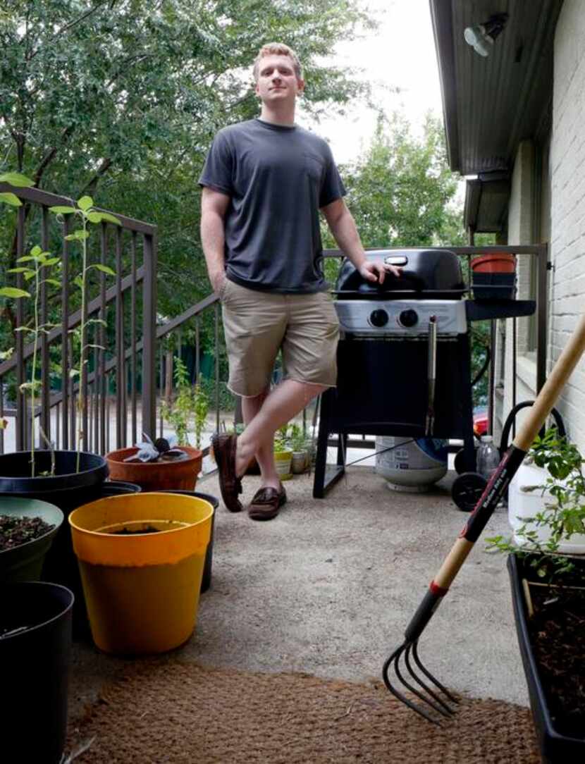 
Corey Stefanowicz, 26, raises vegetables, culinary herbs and strawberries in containers on...