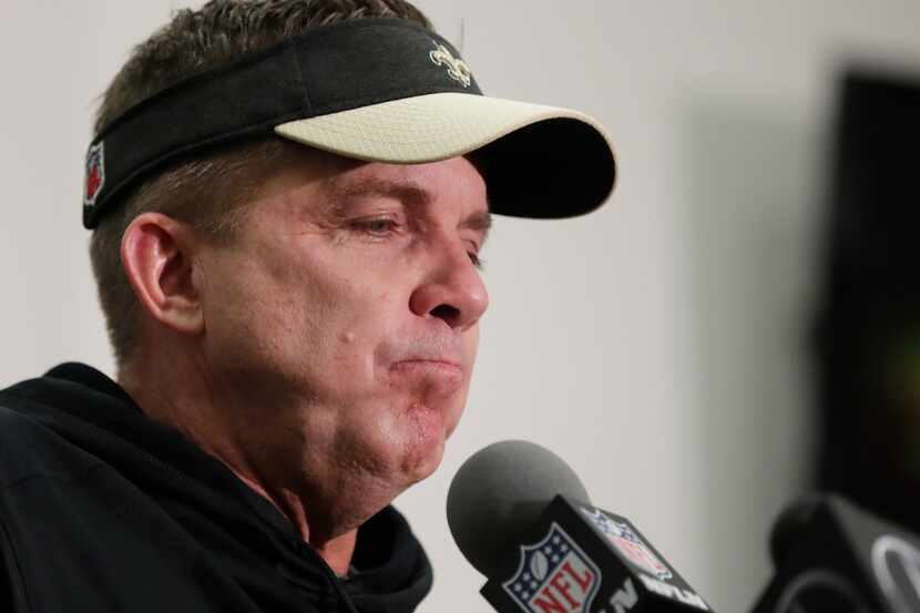 FILE - Saints head coach Sean Payton speaks during a news conference after overtime of the...