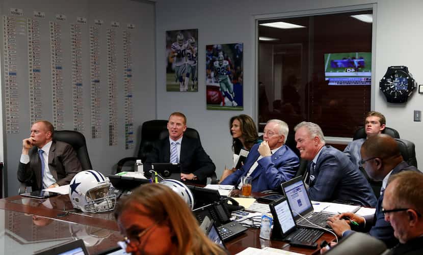 Dallas Cowboys Head Coach Jason Garrett, Owner Jerry Jones and Executive Vice President/COO...
