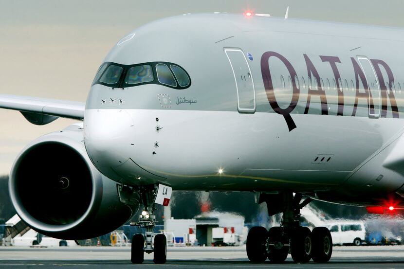 FILE- In this Jan. 15, 2015 file photo, the new Airbus A 350 of Qatar Airways coming from...