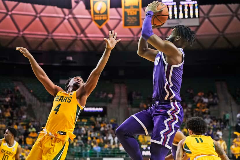 TCU guard Mike Miles Jr. shoots against Baylor guard LJ Cryer (4) during the first half of...