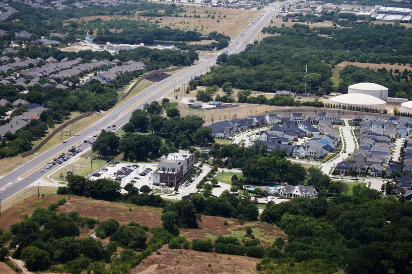 Tucker Hill neighborhood sits up against U.S. 380 in McKinney on July 20. (Vernon Bryant/The...