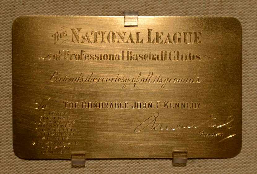 
President John F. Kennedy's gold-colored National League pass.
