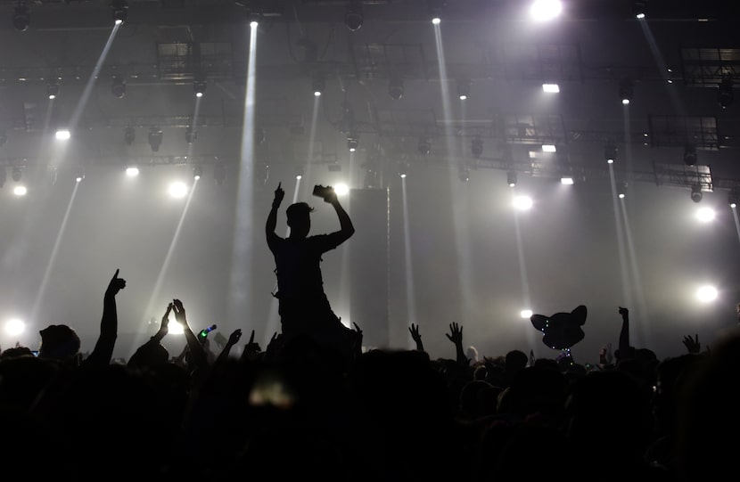 Guests dance to the music during Lights All Night at Dallas Market Hall in 2019. The 2021...