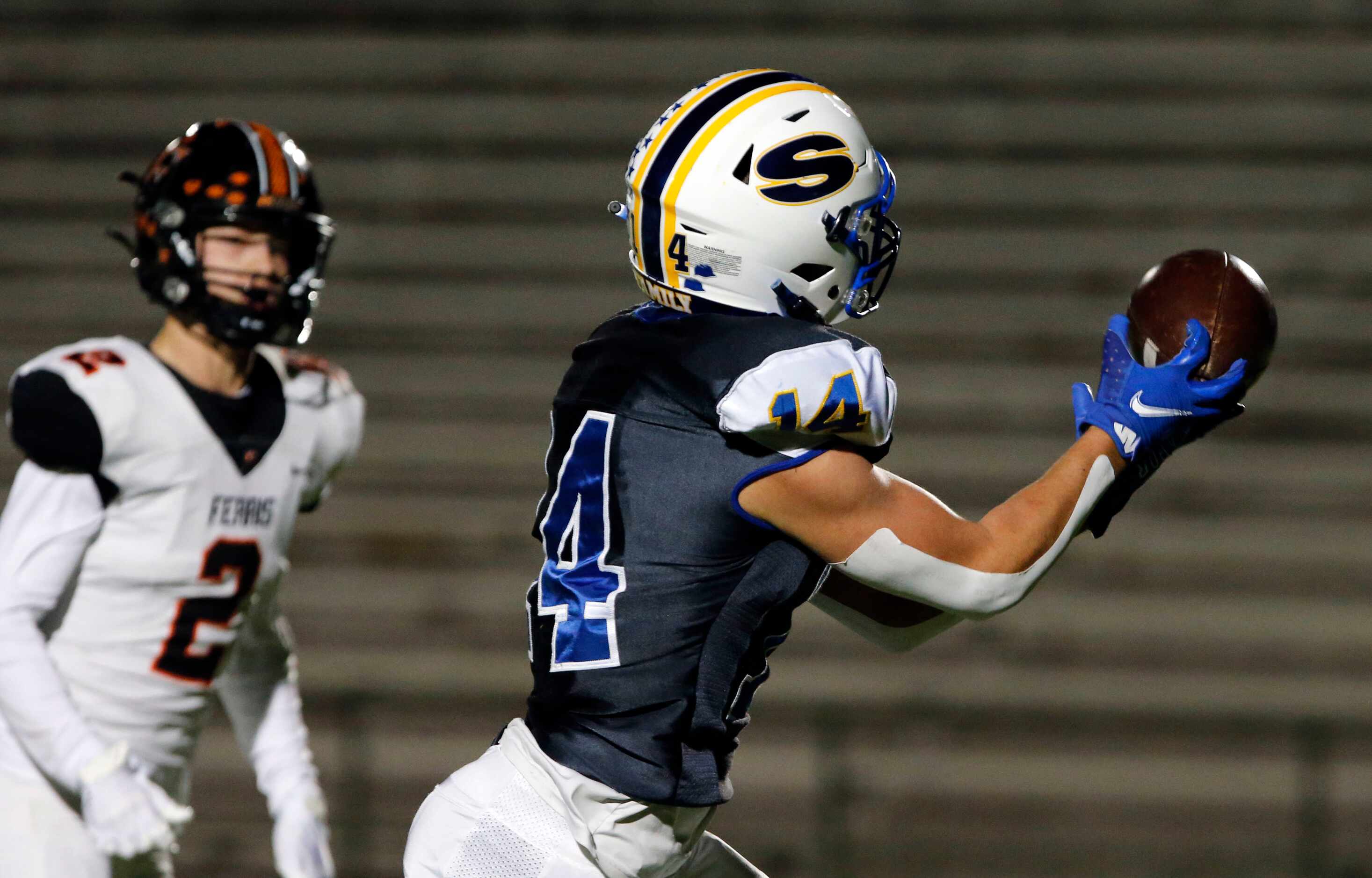 Sunnyvale WR Landry Laird (14) catches a long pass for a touchdown, as Ferris defender Chase...