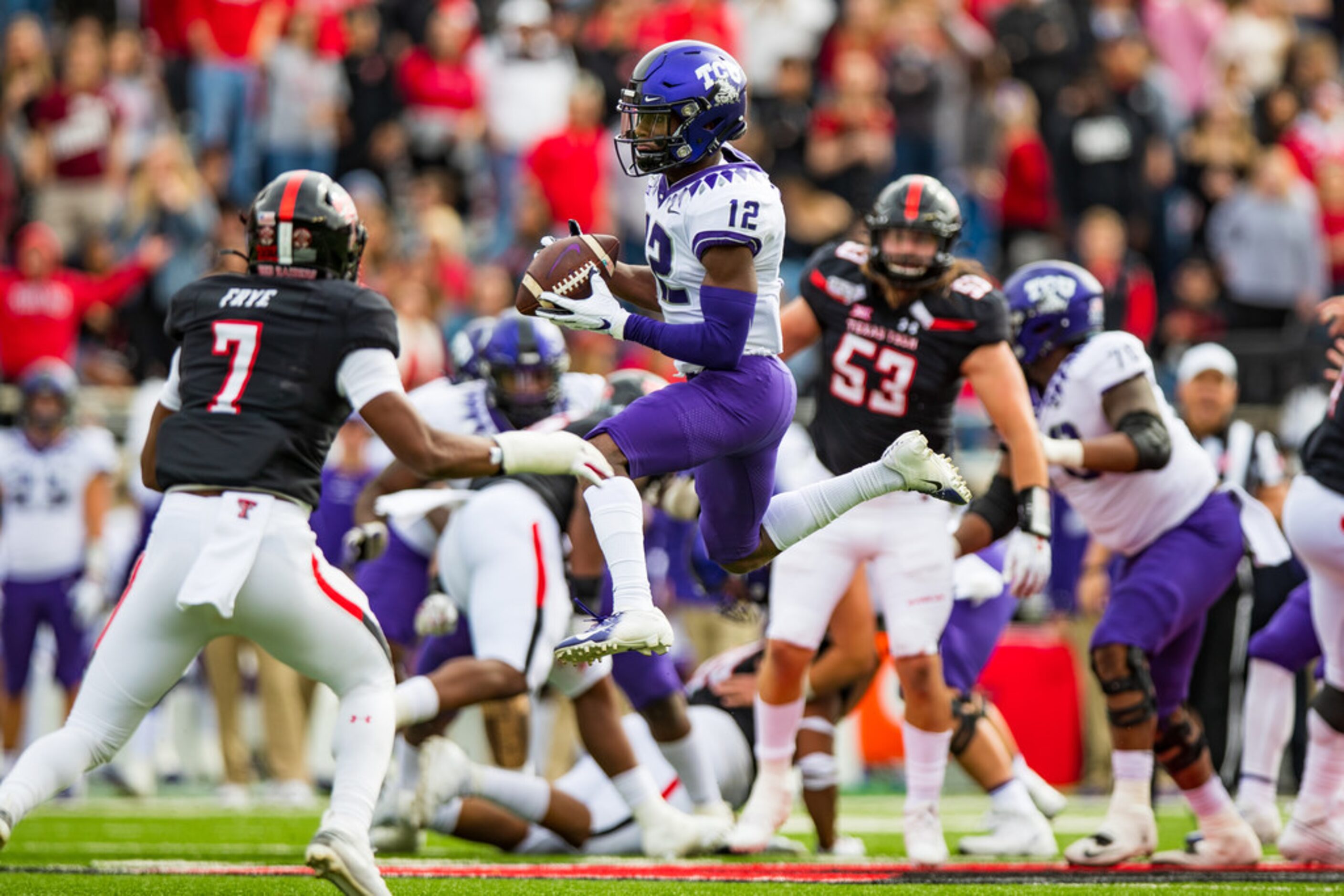 LUBBOCK, TEXAS - NOVEMBER 16: Wide receiver Derius Davis #12 of the TCU Horned Frogs leaps...