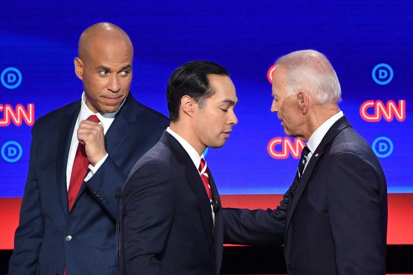 Democratic presidential hopefuls U.S. Sen from New Jersey Cory Booker (left), Former U.S....