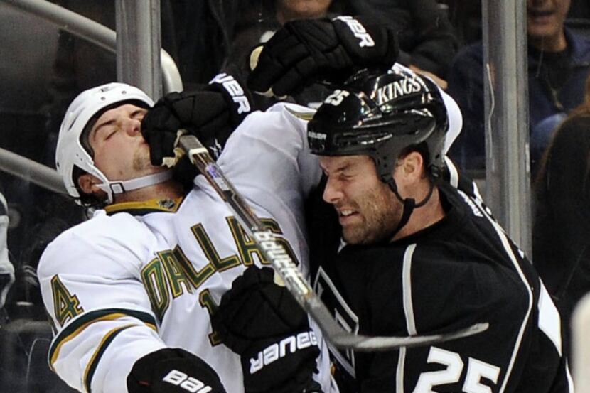 The Stars’ Jamie Benn and the Kings’ Dustin Penner did battle Saturday night in an exciting...