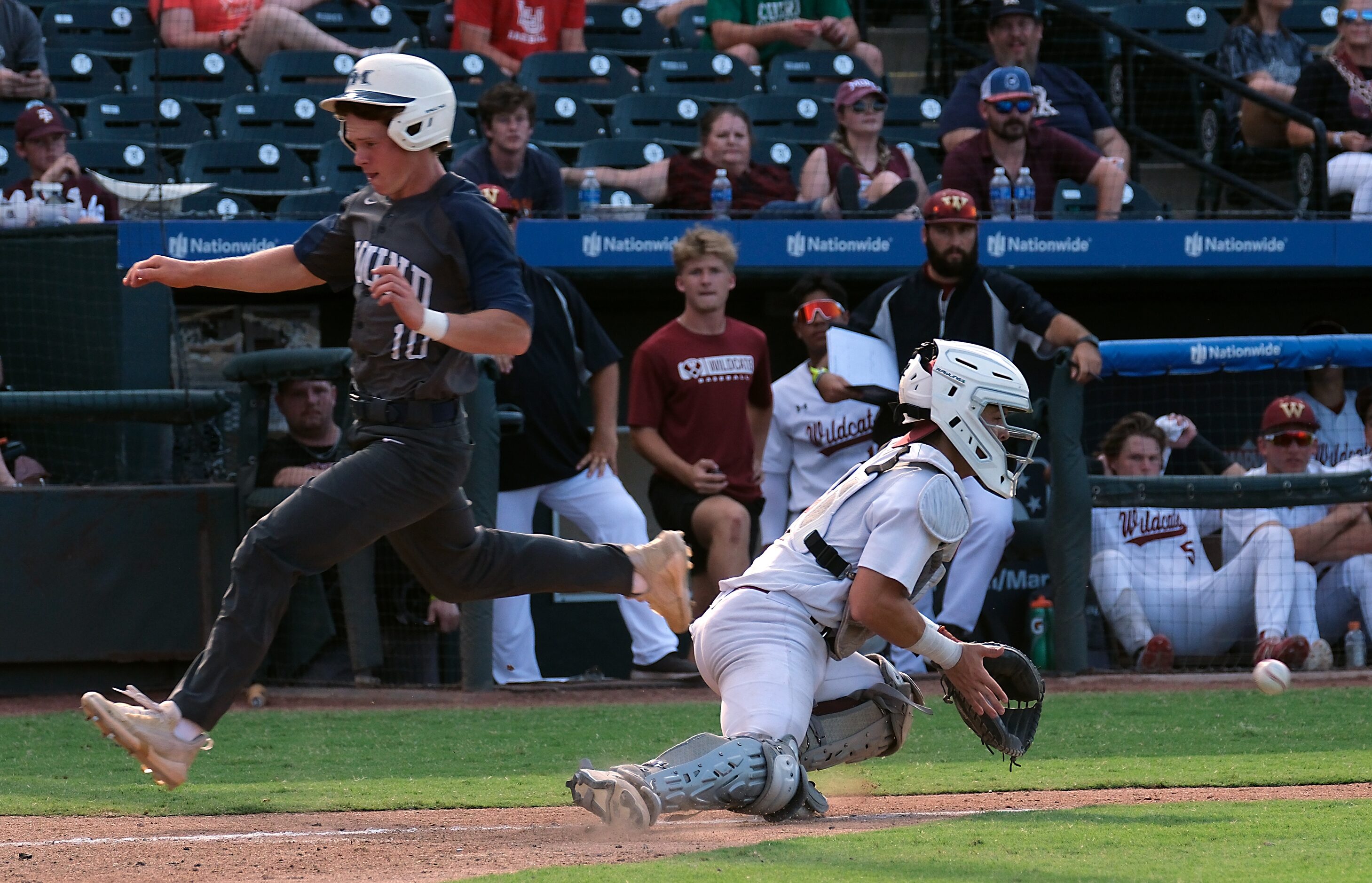 Flower Mound Kole Krause, (10), beats the throw to home plate as Cypress Woods Kaden...