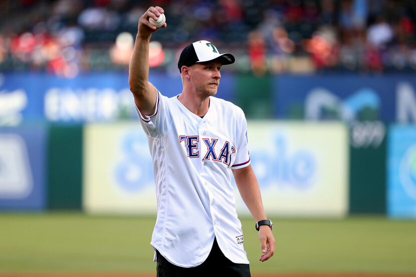 ARLINGTON, TEXAS - JULY 17: Corey Perry of the Dallas Stars prepares to throw out the...