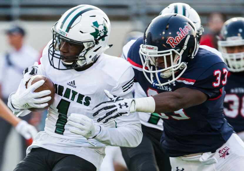 Denton Ryan defensive end Kalob Booker (33) tackles Mesquite Poteet wide receiver Da'Michael...