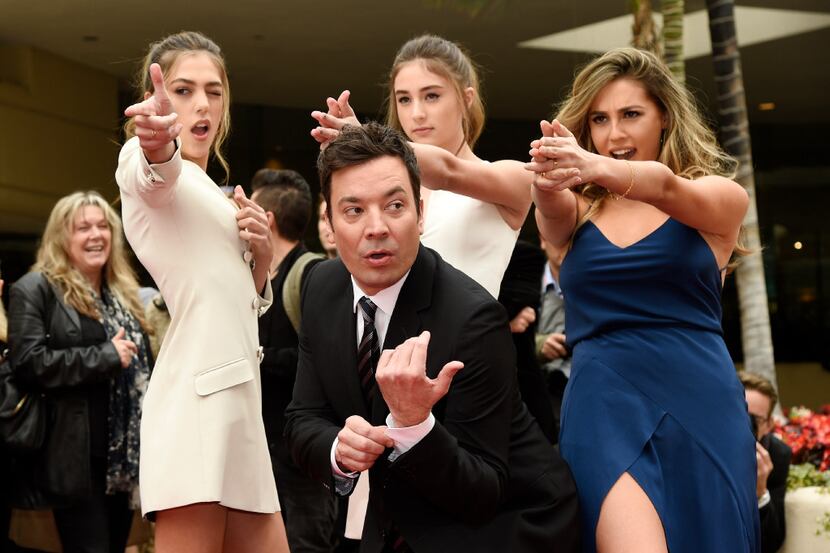 Jimmy Fallon, host of the 74th Annual Golden Globe Awards, poses with Miss Golden Globes...
